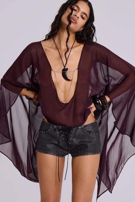 Vaca Whipstitch Faux Leather Mini Shorts in Black